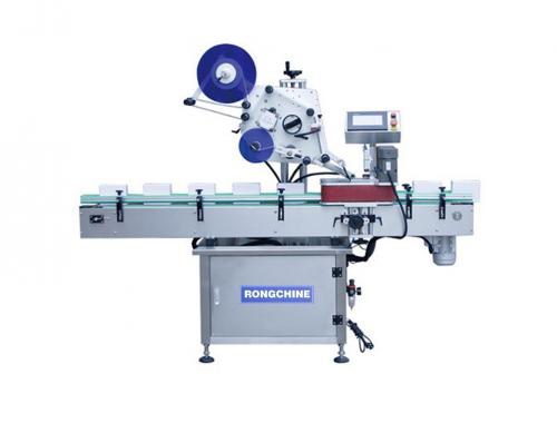 Automatic top surface without adhesive labeling machine
